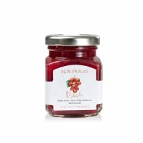Alpe Pragas Fruchtaufstrich aus süß-säuerlichen roten Johannisbeeren, voller authentischer Geschmack.