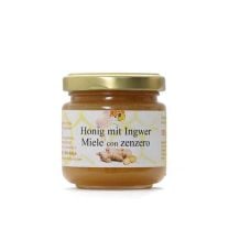 Naturbelassener Blütenhonig mit Ingwer, leichte Schärfe mit zitroniger Note.