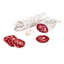 'Trockners Knofl-Weiße' Haussalami, mit ihrem einzigartigen Knoblauchgeschmack und charakteristischem Edelschimmel, ist ein handgemachtes, luftgetrocknetes Meisterwerk, ideal für jede Südtiroler Brotzeit.