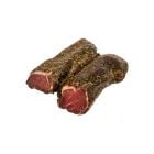 Schweinefilet halbiert im Kräutermantel von Kofler Delikatessen – besonders zart und traditionell gereift.