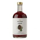 Walcher Zirbensirup BIO in eleganter Glasflasche mit feiner Zirbenoptik und goldfarbenem Verschluss.