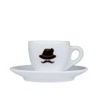 Kuntrawant Schmuggler-Espresso Tasse, markantes Schnäuzer-Emblem, als Symbol für die historische Kaffee-Schmuggeltradition in Südtirol. 